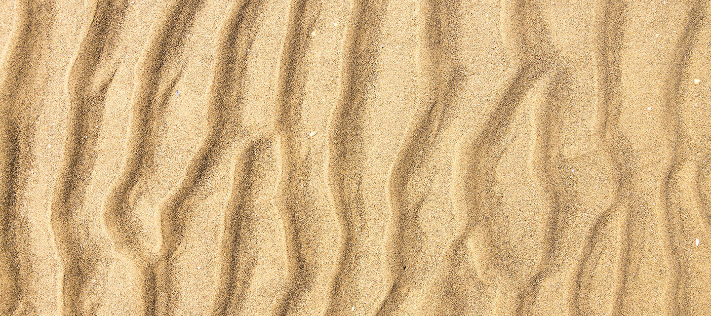 Lines and ridges in the sand resembling stetch marks on skin